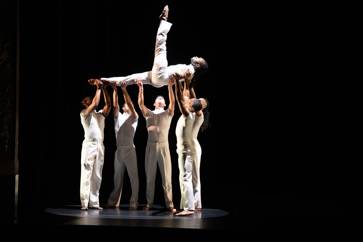 On the wings of angels men lifting men